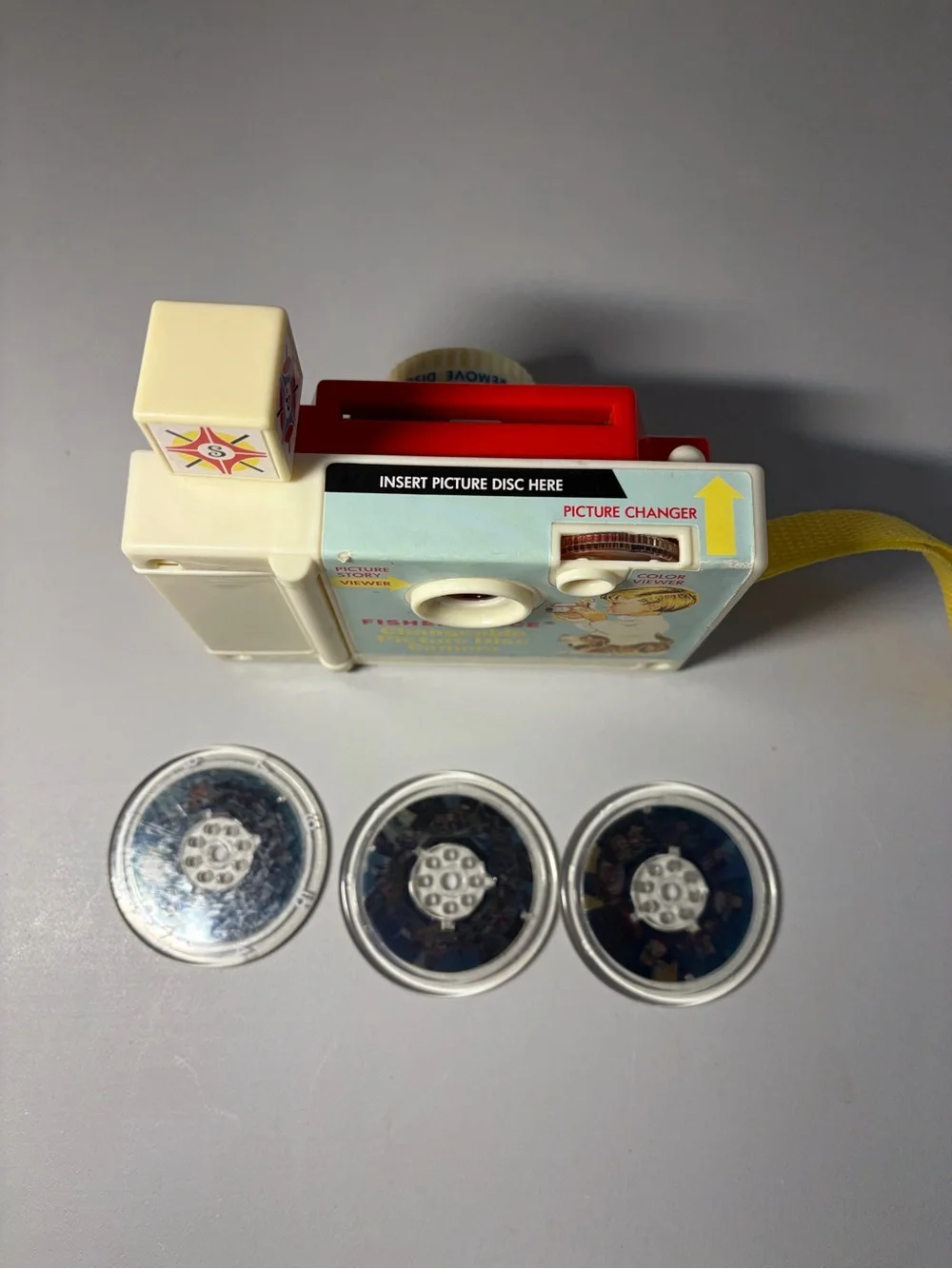 Fisher-Price Red Toy Camera with Yellow Strap and White Lens